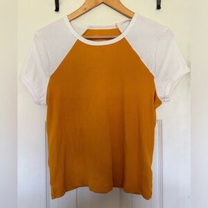 Yellow shirt with white cap sleeves